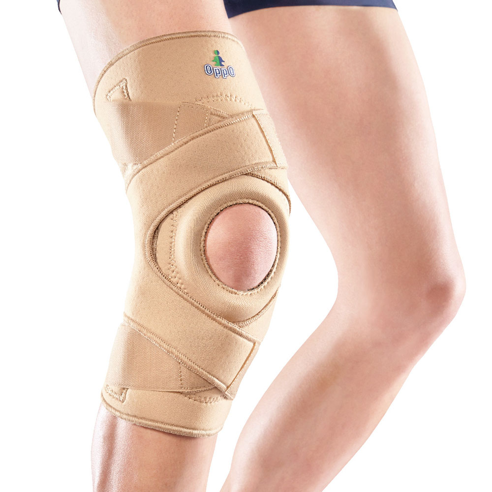 Stabilizator kolana z silikonowymi wzmocnieniami bocznymi oraz zapięciem krzyżowym 1033