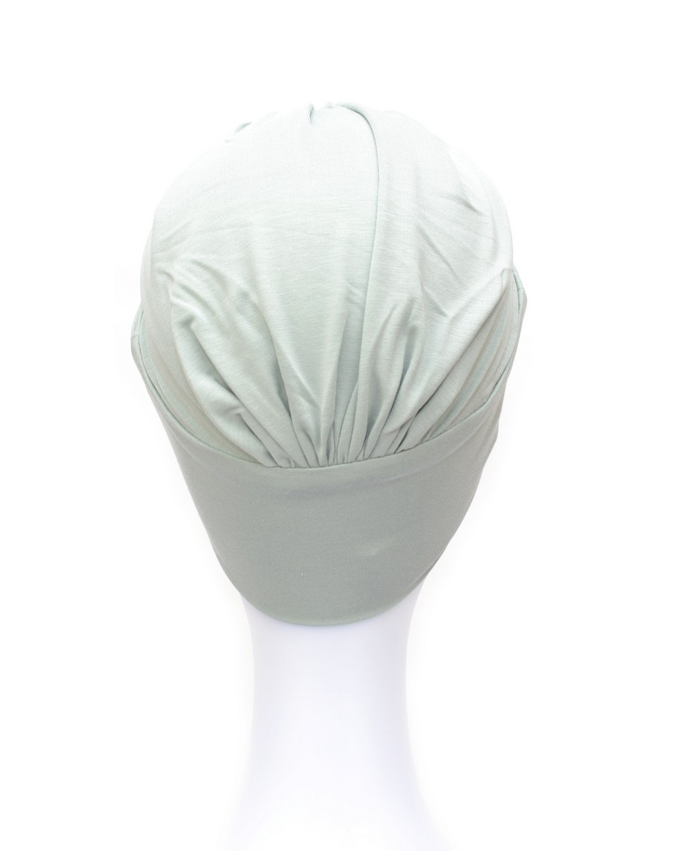 Elegancki turban z subtelnymi zakładkami materiału PRAGUE B/103 pistacja*